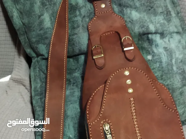 شنطه رجالي جلد طبيعي صناعه يدويه