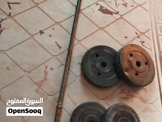 بار حديد + اوزان 15 كيلو ................ . . . . . . .