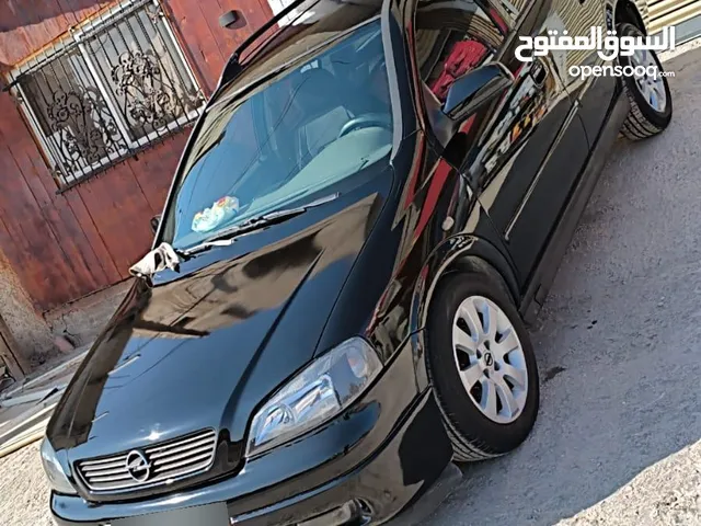 أوبل استرا ستيشن 99 اتماتيك بنزين متور 1600 ضبل فحص ممتاز ترخيص تامين