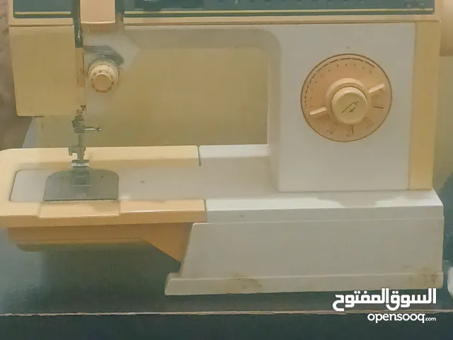 ماكينة خياطة وتطريز منزلي سنجر