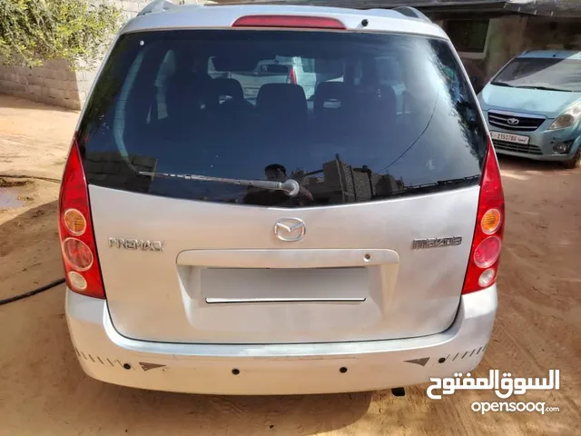 مازدا بريماسي للبيع بحالة ممتازه كمبيو عادي مكيفه ماشيه 198 الف كيلو