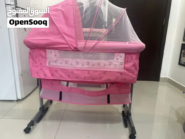 Pink color cradle for babies