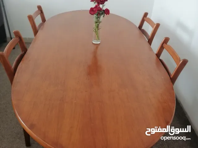 ميز طعام مع 6 كراسي خشب صاج للبيع بسعر 250000 د.ع