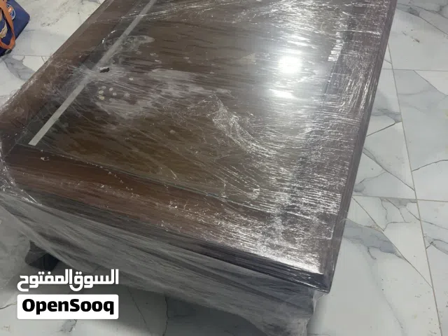 طاوله خشب اللون بني خشابي خشب زان اصلي وكاله لم تستعمل ابدا اجمل من الصور