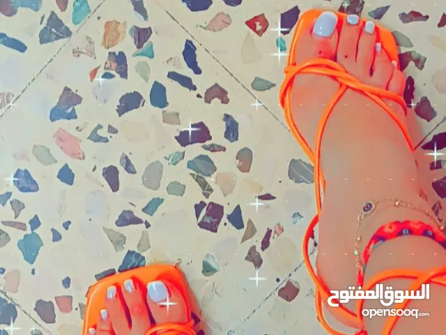 Orange With Heels in Amman