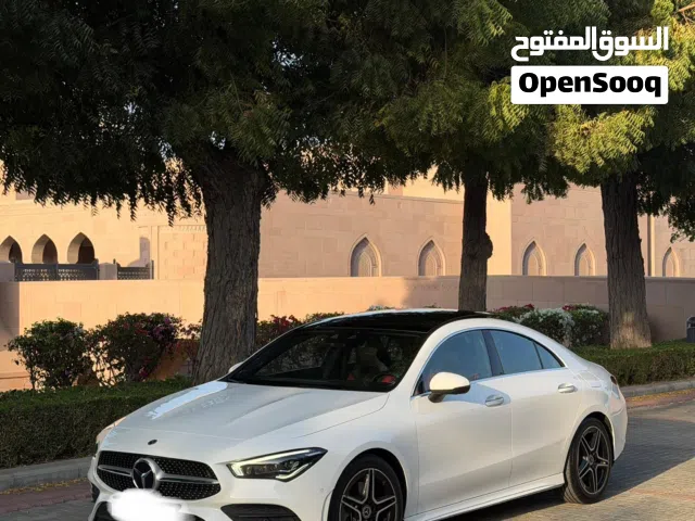 مرسيدس AMG CLA 250 (خليجي) 2021 بانورما 3 فصوص ابيض وداخل احمر بحالة وصبغ وسيرفس الوكالة كالجديد