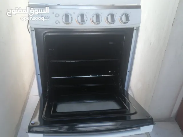 عرض خاص على فرن Midea النظيف!" هل تبحث عن فرن عملي، أنيق، وبسعر رائع؟ فرن Midea الأصلي متوفر الآن بح