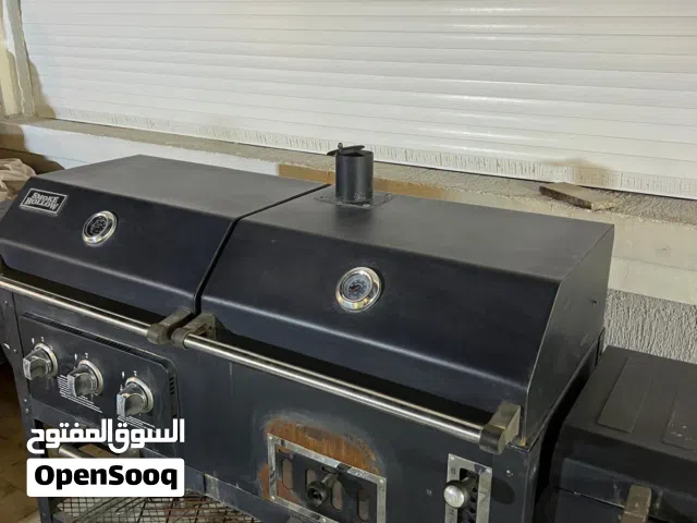 الة شوي على الغاز والفحم