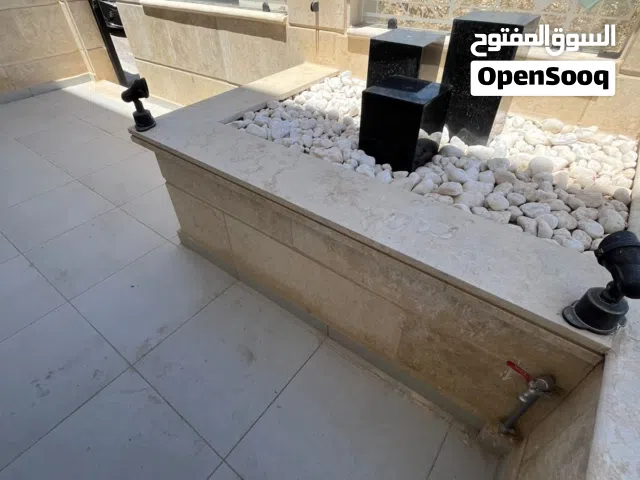 شقة شبه ارضي مع ترس 130م في مرج الحمام خلف مدارس الراهبات