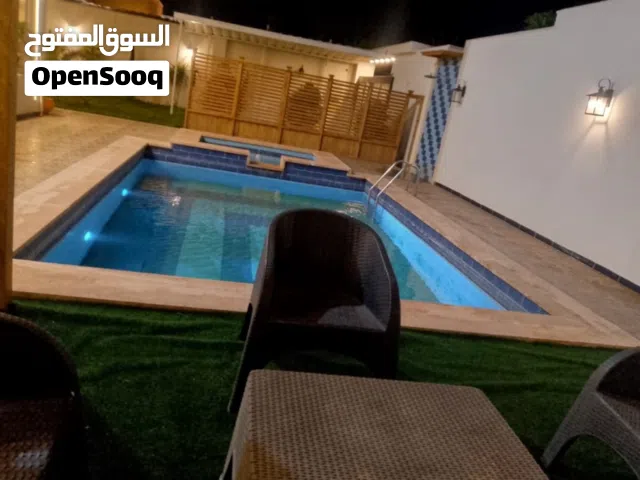 استراحة كاملة الاثات للبيع عين زارة الباعيش سكن او استثمار سعر كزيوني