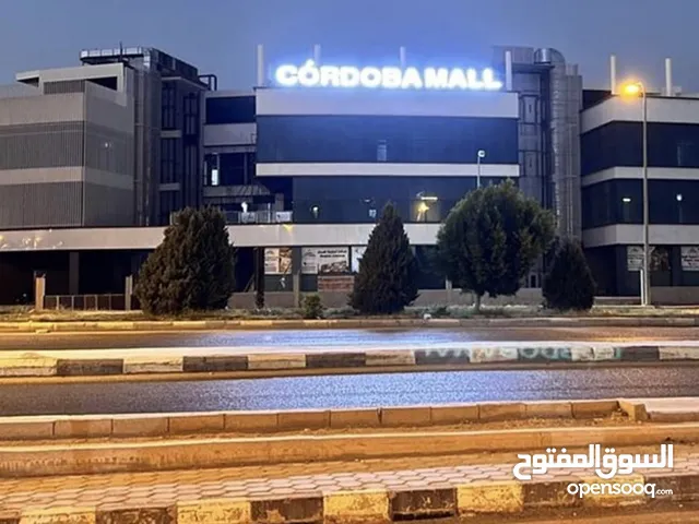 محل للبيع 26 م بالطابق الثاني بمول الحى الاسباني ( قرطبة مول ) حدائق اكتوبر