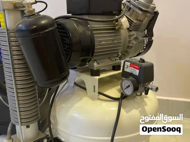 كمبريسور سرير الأسنان وجهاز الشفط