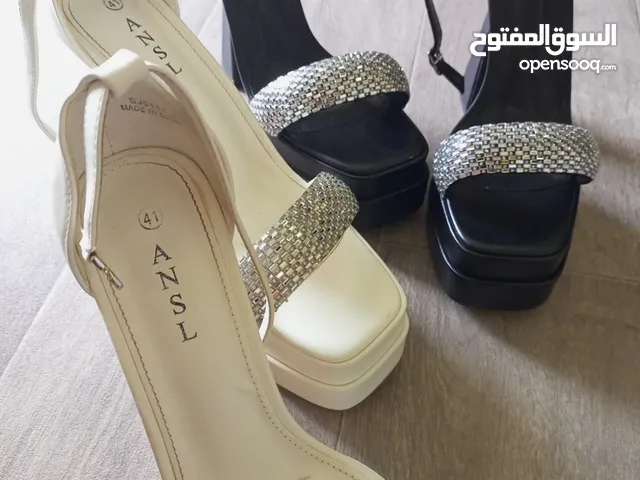 Black With Heels in Amman