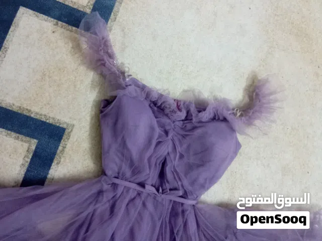 فستان يجمع بين النعومه والفخامه