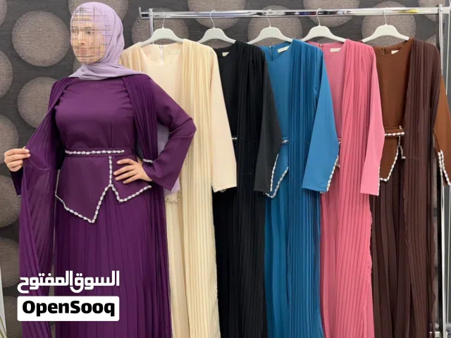 فساتين تجنن بمعنى الكلمه