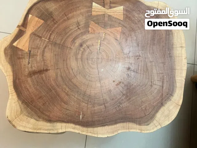 All-wood tree trunk coffee table