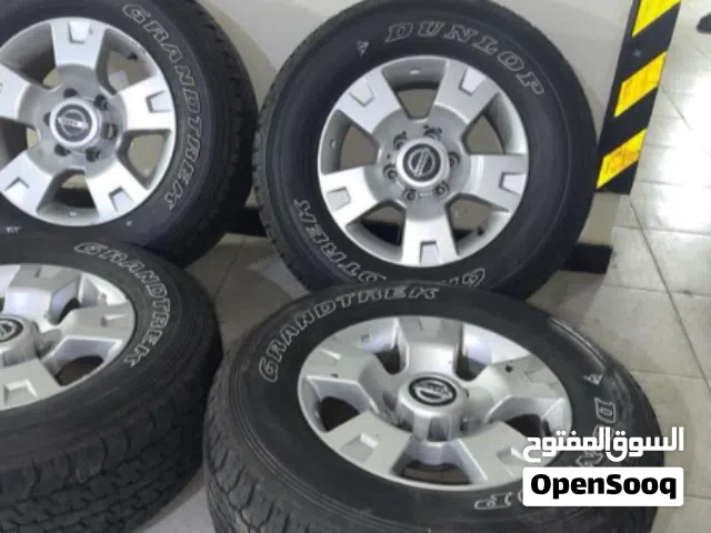 رنقات نيسان فتك مع كفرات دنلوب الاصلي مقاس 275.65.17 للبيع