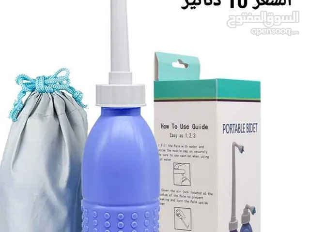 شطاف ماء متنقل صغير مناسب للسفرشطاف المسافر بخاخ المضخة اليدوي باليد .