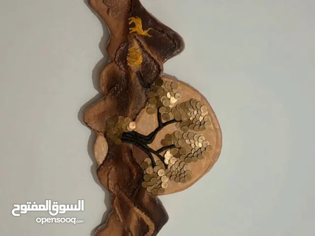 لوحه حائط من عجينة الورق والعملات