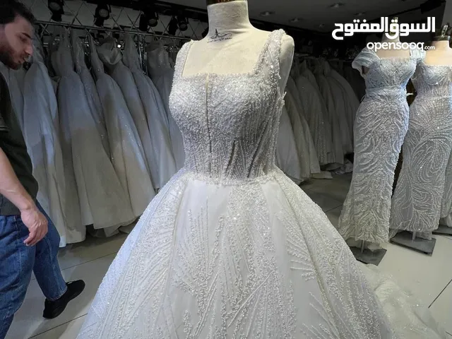 فستان عرس من المصمم سيف العامري وفستان مهر