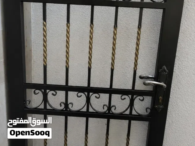 باب حمايه حديد مع باب خشب