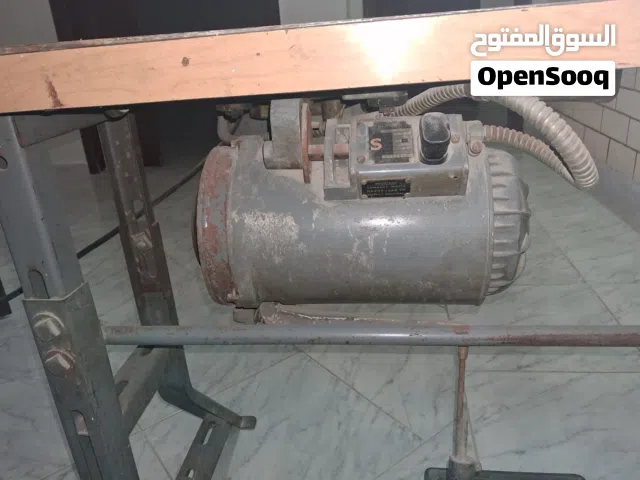 طاولة خياطه سنجر مع ماتور شغال