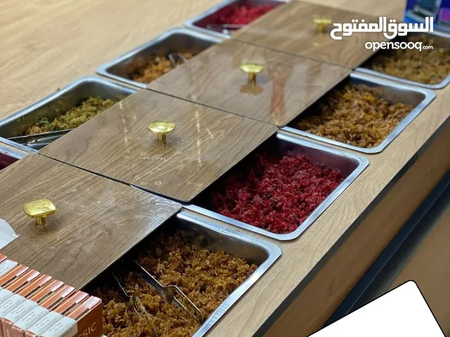 ديكور + طاولة + البضاعة الموجوده داخل المحل ) مشروع استثماري