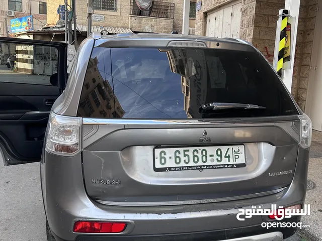 ميتسوبيشي اوت لاندر فل اضافات كرسي كهرباء تدفئة مقاعد وتبريد ايضا كاربون فايبر فتحة سقف مثبت سرعة