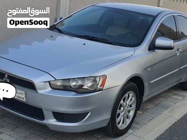 Mitsubishi Lancer 2014 shark shape 2.0 L Well maintained 2nd owner passing insurance till Sept 2026