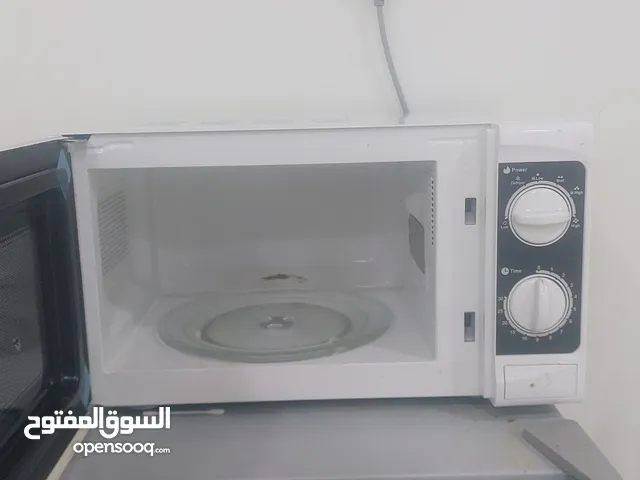 Microwave and electric cooker for sale together