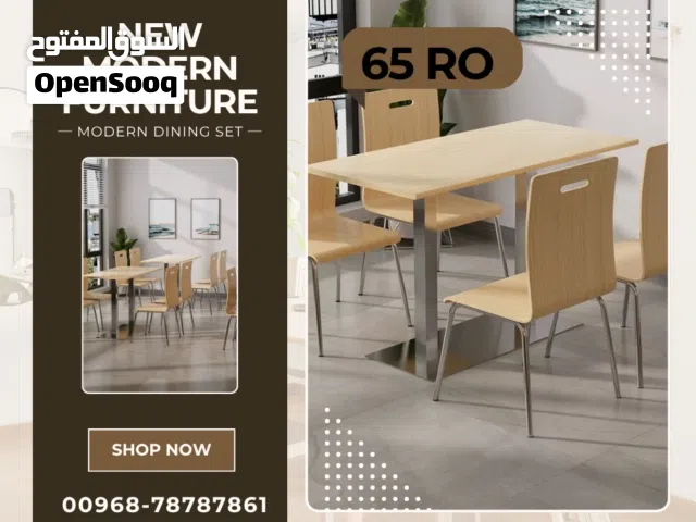 Pedestal Café Table paired with four Bentwood Café Stack Chairs
