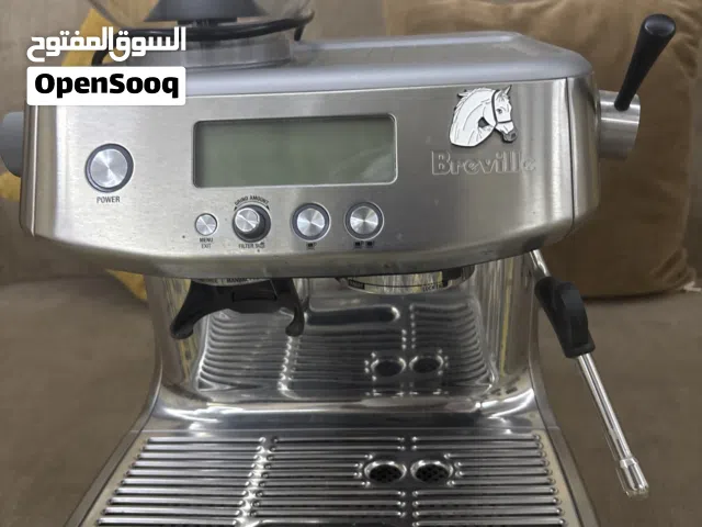 مكينة قهوه ومطحنه بنفس الوقت