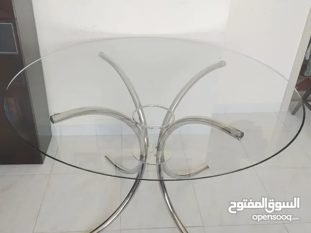 4 -seater clear glass Dining Table