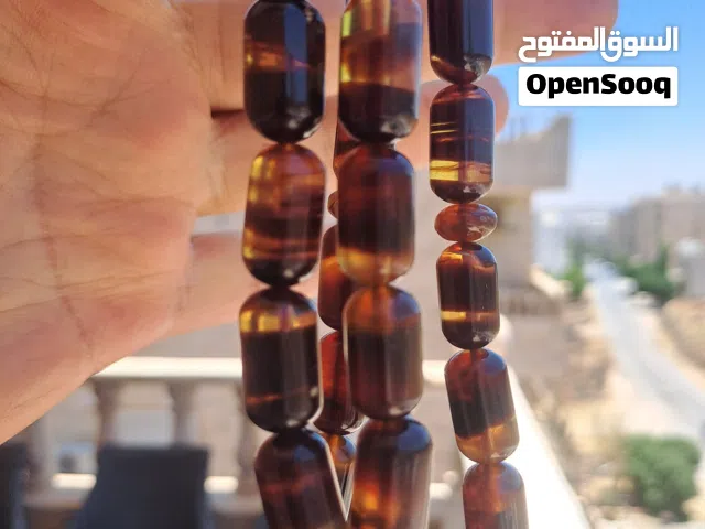 مسبحة كهرمان عنبر سومتي خراطه يدويه حجر واحد