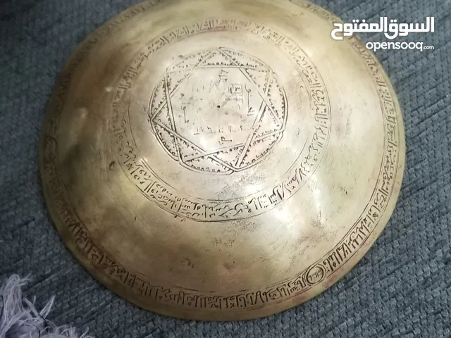 طاسه بنقوش ورموز