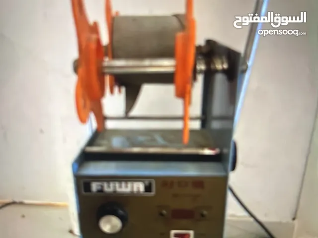 ماكينه غلق الاكواب