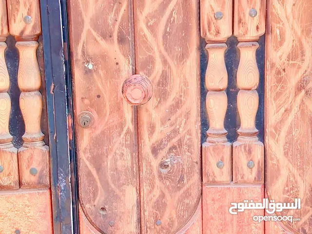 باب مغلف خشب وحدىد بدون قفص