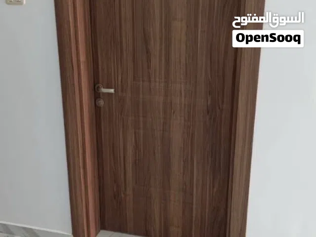 باب تركي داخلي من الخشب المعالج كامل بالقفص والأكسورات مقاس 2.20*100