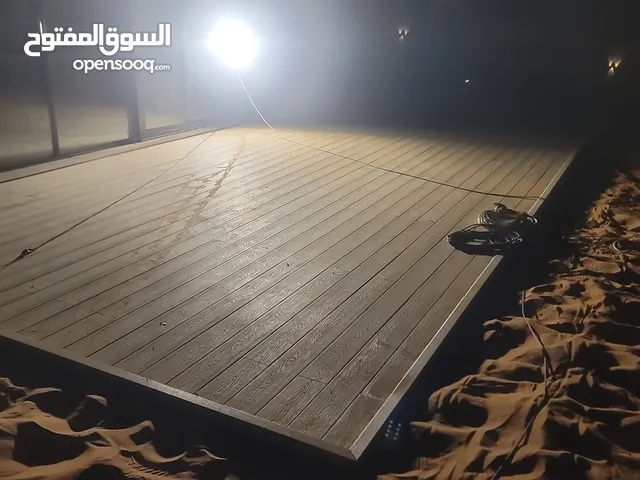 I have experience in WPC decking installation. I can install outdoor wooden-style flooring made of W