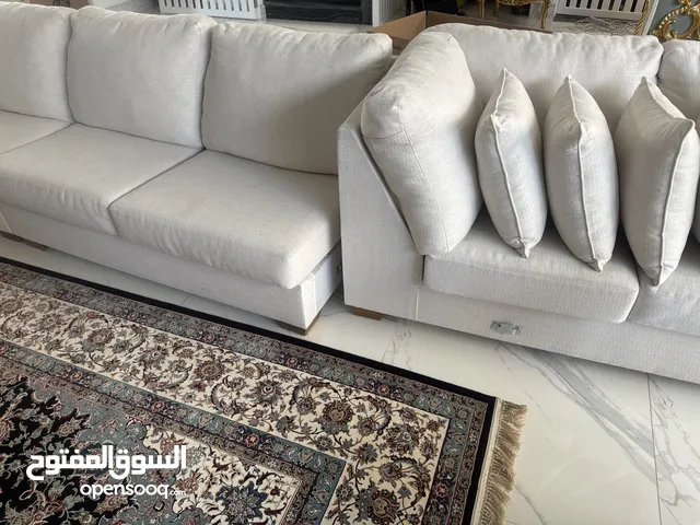 Huge long family sofa off white