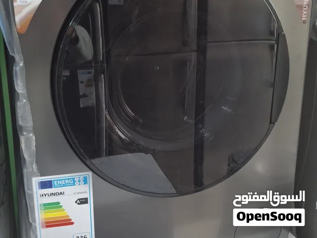 غساله هونداي كوري تجميع تركي 10 كيلو 1400 دوره 15 برنامج لون سلفر على اسود ماتور انفرتر توفير عالي