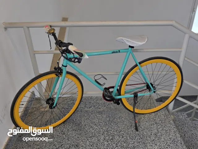Pikok bicycle, 53 inches, turquoise and yellow including, rear bike bags, front and rear bike lights
