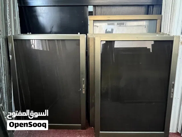 شبابيك المنيوم 200*125 لون شمبين زجاج برونز بحال الوكاله مع كامل اغراضهم
