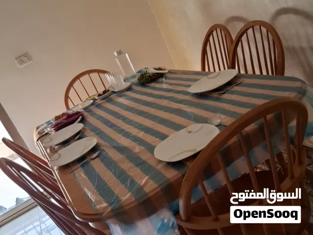 طاولة سفرة مع 6 كراسي للبيع وارد كندا ويرافقها وصله طول مقدار 80 سم