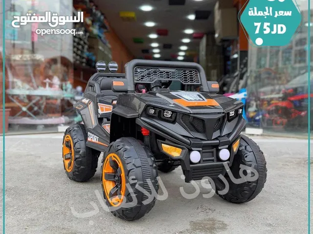 سياره 4 ماتور جامبو مع روموت و هزاز و موسيقى و اناره تناسب من عمر 1 الي 8 سنوات حسب حجم الطفل