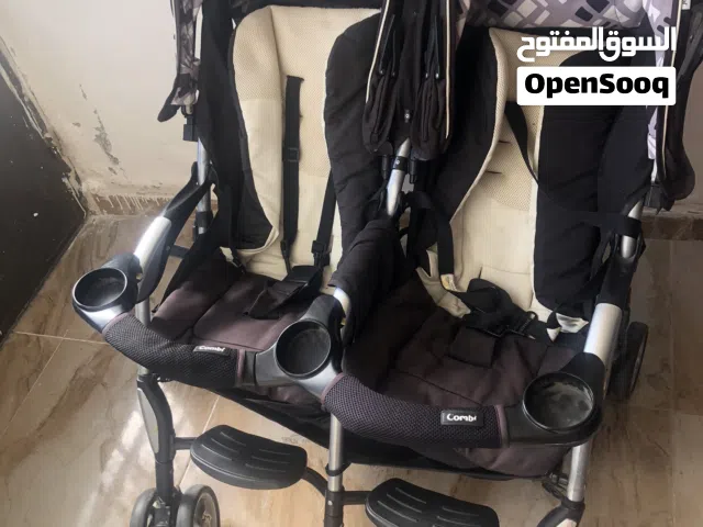 عرباية اطفال شارع توأم مستعمل بحال الجديد