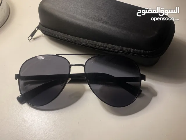 ‏نظارة شمسية مع البوكس حقها (قبلية التفاوض)