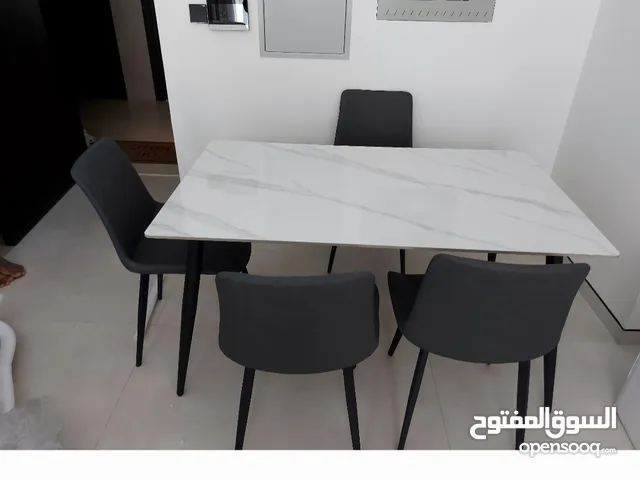 Brand new white marble Dining table with 4 chairs available good quality more clr available pm