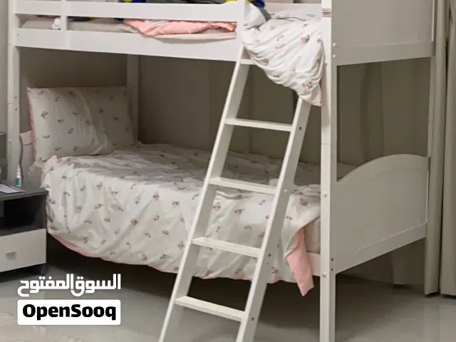 Bunk bed with mattress, side table and dressing table