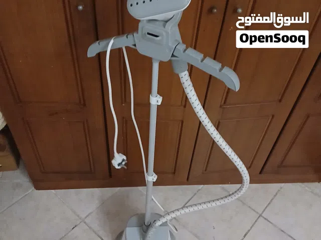 كاوية ملابس بخار